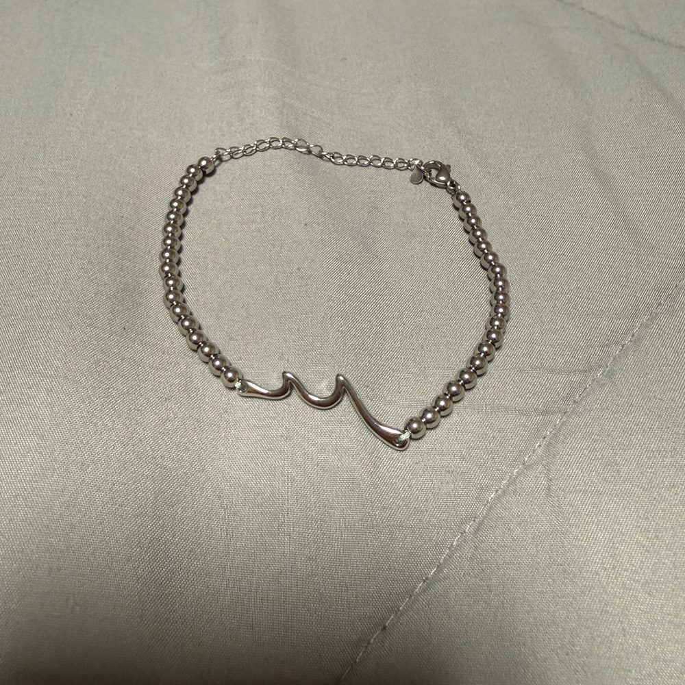 Amazon Silver Beaded Bracelet with Wave Design
